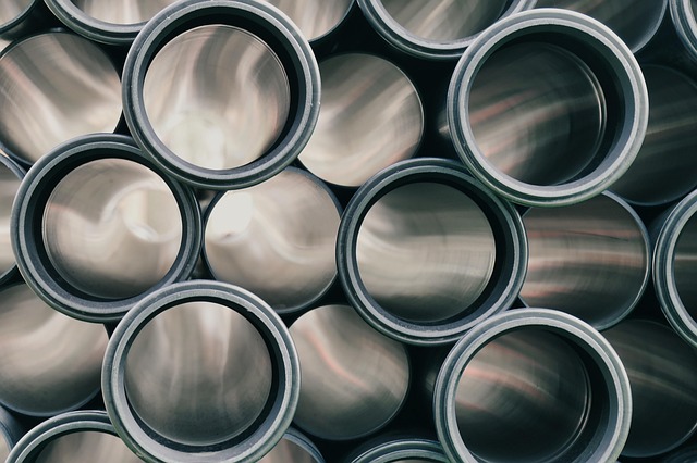 team of smart home technology specialists reviewing system blueprints